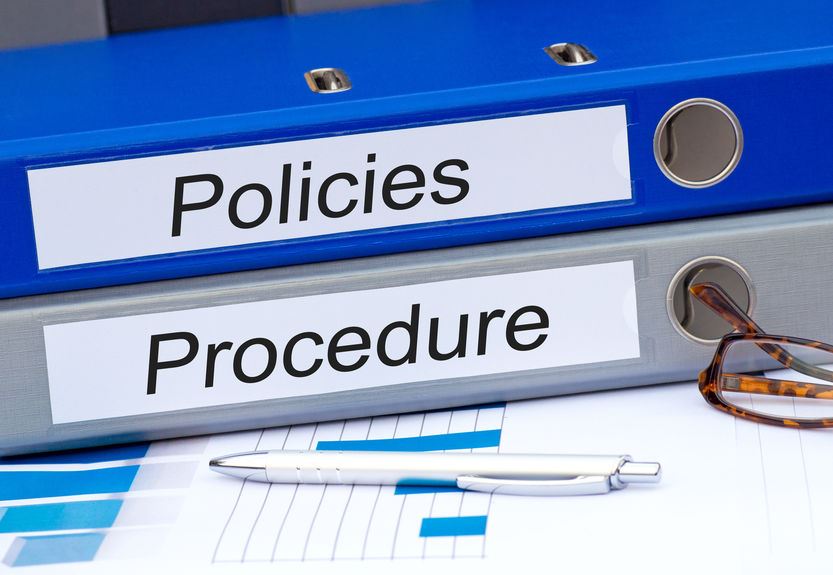 Notebooks labeled with Policies and Procedures